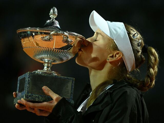 Kazakhstan's Elena Rybakina kisses her trophy celebrating winning the final match of the Women's WTA Rome Open tennis tournament against Ukraine's Anhelina Kalinina at Foro Italico in Rome on May 20, 2023. Rybakina wins the Rome WTA at the start of the second set of the finals after Kalinina forefeited due to an injury.