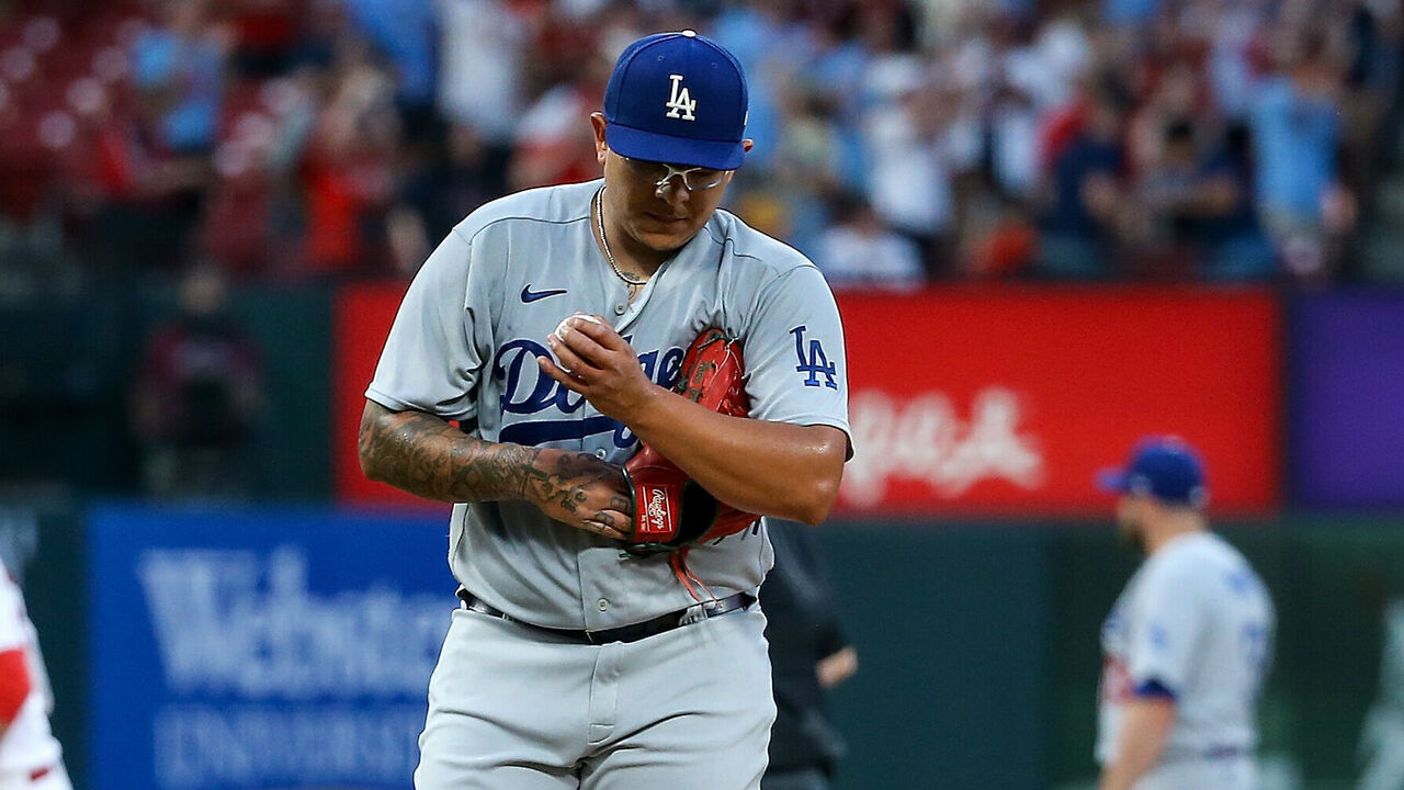 ST. LOUIS, MO - MAY 18: Julio Urias #7 of the Los Angeles Dodgers walks to the top of the mound after giving up a solo home run to Nolan Gorman #16 of the St. Louis Cardinals during the third inning at Busch Stadium on May 18, 2023 in St. Louis, Missouri.