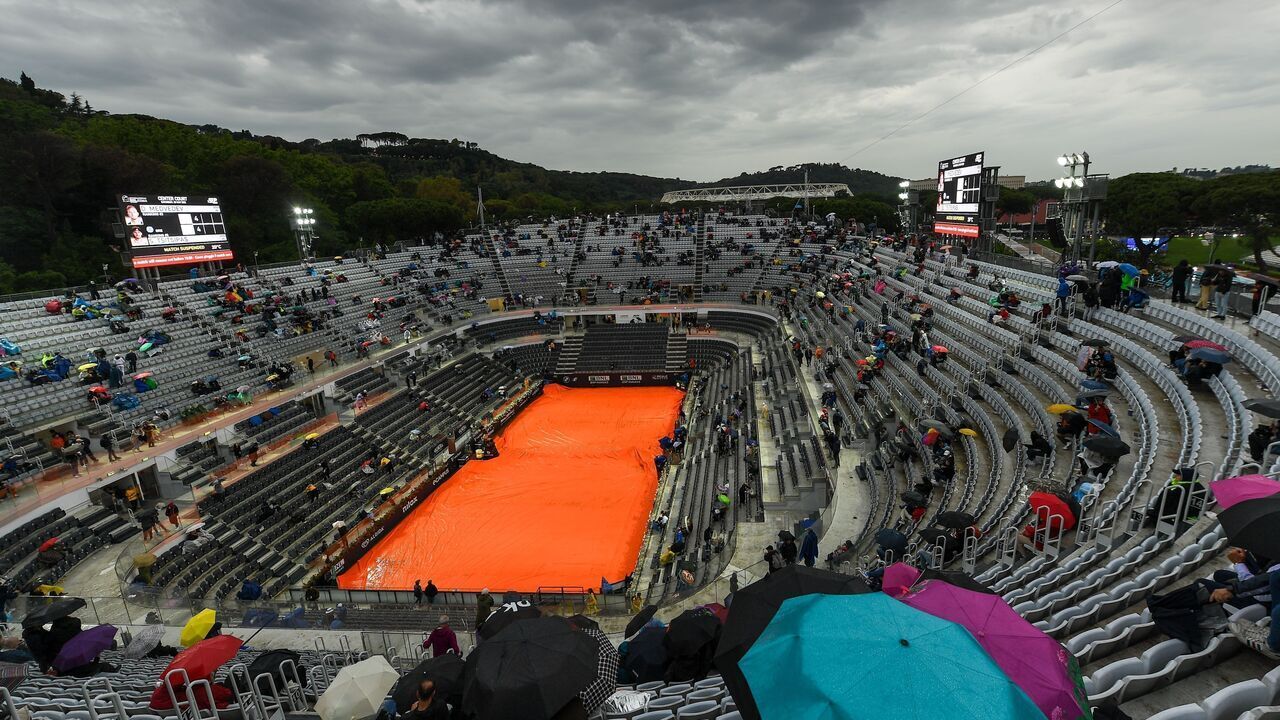 ROME, ITALY - MAY 20: A general view of the court covered with tarps during the men's singles semi-final match between Stefanos Tsitsipas of Greece and Daniil Medvedev during day thirteen of the Internazionali BNL D'Italia at Foro Italico on May 20, 2023 in Rome, Italy.