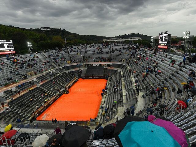 ROME, ITALY - MAY 20: A general view of the court covered with tarps during the men's singles semi-final match between Stefanos Tsitsipas of Greece and Daniil Medvedev during day thirteen of the Internazionali BNL D'Italia at Foro Italico on May 20, 2023 in Rome, Italy.