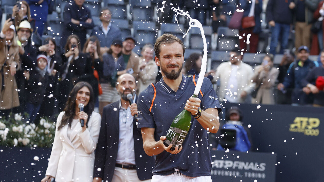 ROME, ITALY - MAY 21: Daniil Medvedev of Russia celebrates with the champagne during the award ceremony after the match between Rune vs Medvedev of the Internazionali BNL D'Italia 2023 - Day Fourteen at Foro Italico on May 21, 2023 in Rome, Italy.