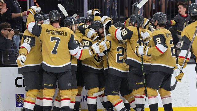 LAS VEGAS, NEVADA - MAY 21: Chandler Stephenson #20 of the Vegas Golden Knights is congratulated by teammates after scoring the game winning overtime goal against the Dallas Stars in Game Two of the Western Conference Final of the 2023 Stanley Cup Playoffs at T-Mobile Arena on May 21, 2023 in Las Vegas, Nevada.