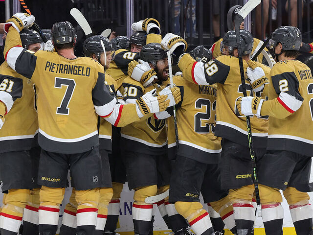 LAS VEGAS, NEVADA - MAY 21: Chandler Stephenson #20 of the Vegas Golden Knights is congratulated by teammates after scoring the game winning overtime goal against the Dallas Stars in Game Two of the Western Conference Final of the 2023 Stanley Cup Playoffs at T-Mobile Arena on May 21, 2023 in Las Vegas, Nevada.