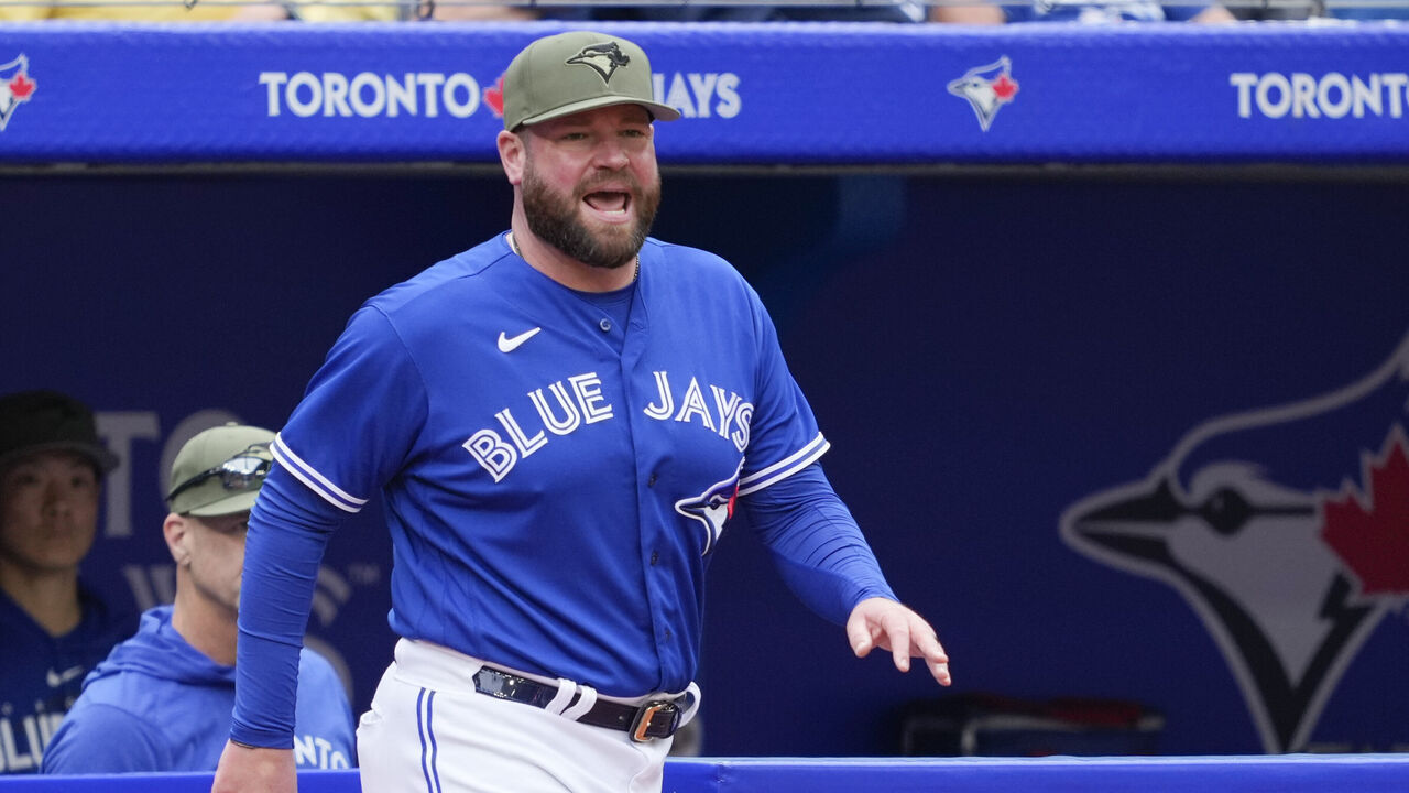 TORONTO, ON - MAY 20: John Schneider manager of the Toronto Blue Jays walks on the field against the Baltimore Orioles during the eighth inning in their MLB game at the Rogers Centre on May 20, 2023 in Toronto, Ontario, Canada.