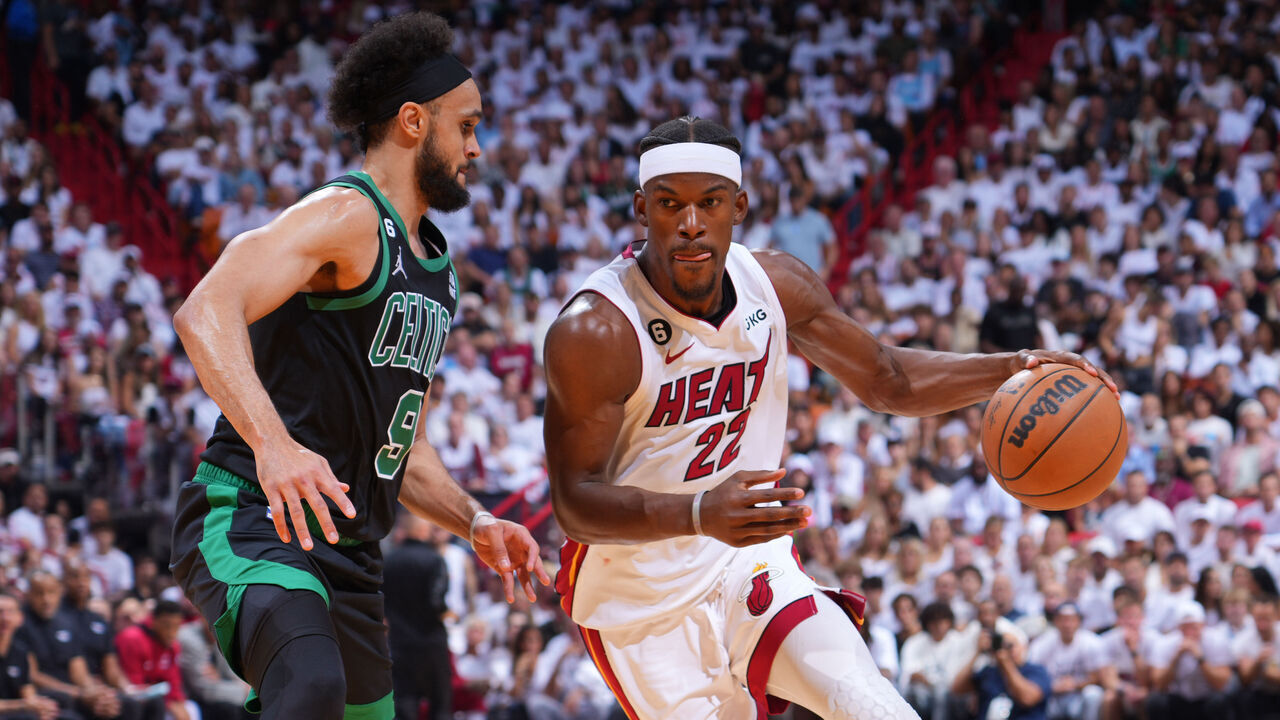 MIAMI, FL - MAY 21: Jimmy Butler #22 of the Miami Heat dribbles the ball during Game Three of the Eastern Conference Finals against the Boston Celtics on May 21, 2023 at the Kaseya Center in Miami, Florida. Mandatory Copyright Notice: Copyright 2023 NBAE