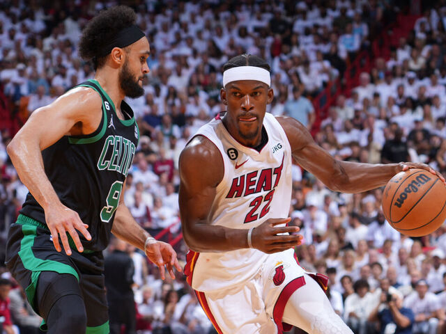 MIAMI, FL - MAY 21: Jimmy Butler #22 of the Miami Heat dribbles the ball during Game Three of the Eastern Conference Finals against the Boston Celtics on May 21, 2023 at the Kaseya Center in Miami, Florida. Mandatory Copyright Notice: Copyright 2023 NBAE