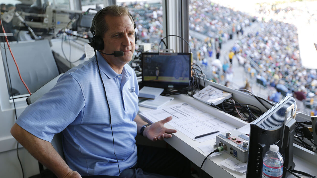 MESA, AZ - MARCH 8: Broadcaster Glen Kuiper Jr. of the Oakland Athletics works from the pressbox during the game against the Chicago White Sox at Hohokam Stadium on March 8, 2015 in Mesa, Arizona.