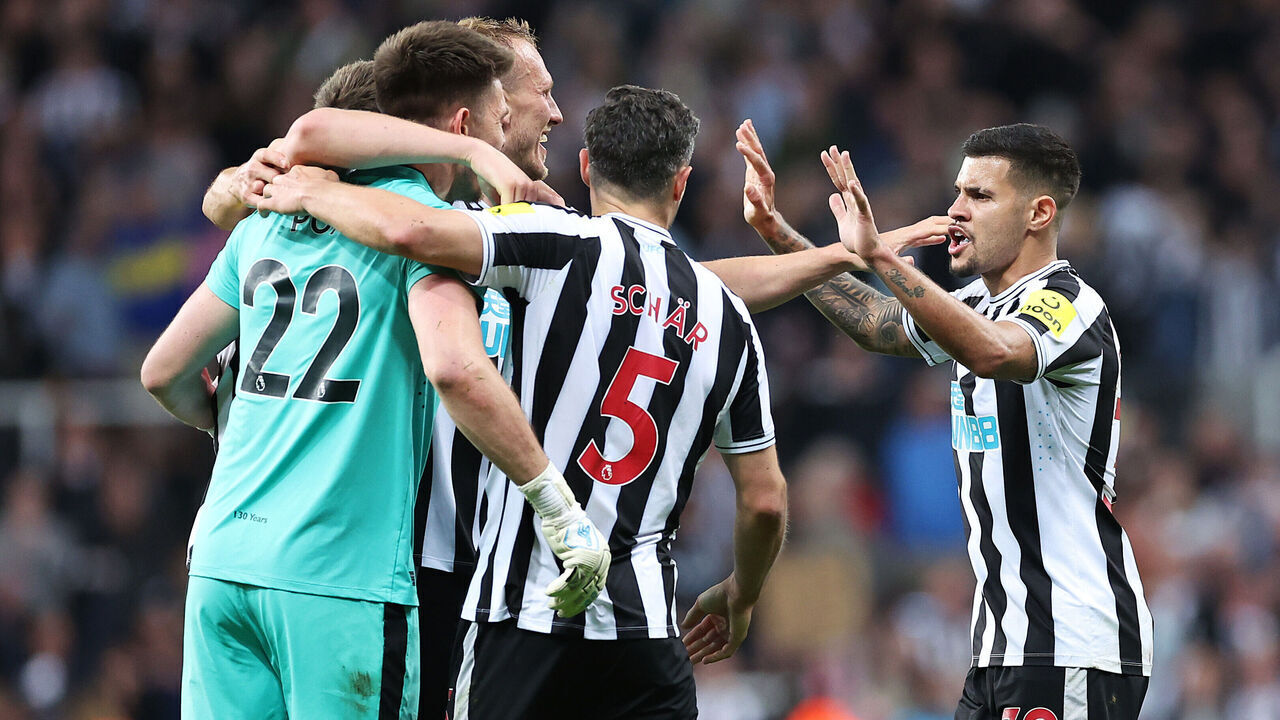 NEWCASTLE UPON TYNE, ENGLAND - MAY 22: Nick Pope, Sven Botman (obscured), Dan Burn, Fabian Schaer and Bruno Guimaraes of Newcastle United celebrate after qualifying for the UEFA Champions League following the Premier League match between Newcastle United and Leicester City at St. James Park on May 22, 2023 in Newcastle upon Tyne, England.