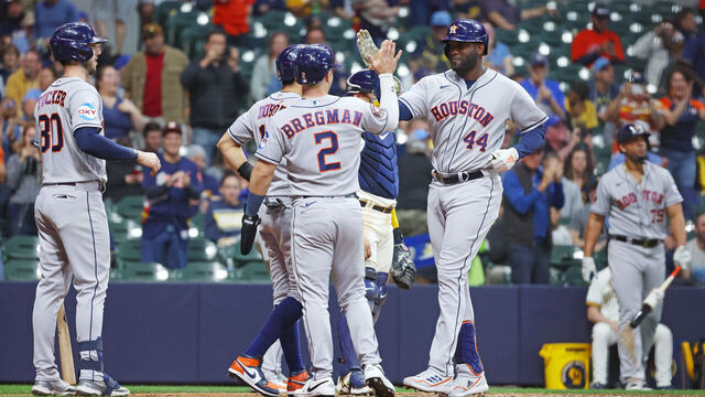 MILWAUKEE, WISCONSIN - MAY 22: Yordan Alvarez #44 of the Houston Astros is congratulated following a grand slam against the Milwaukee Brewers during the sixth inning at American Family Field on May 22, 2023 in Milwaukee, Wisconsin.