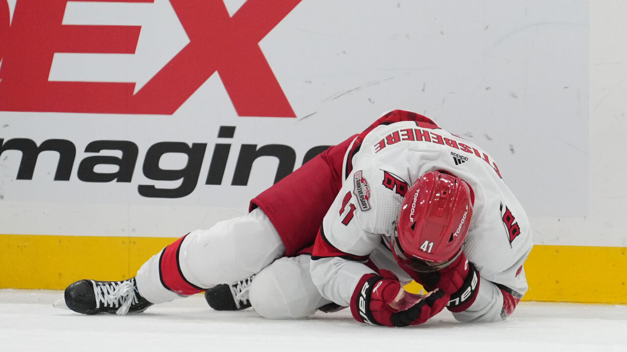 SUNRISE, FL - MAY 22: Carolina Hurricanes defenseman Shayne Gostisbehere (41) holds his face in pain in the third period during game three of the Eastern Conference Finals between the Carolina Hurricanes and the Florida Panthers on Monday, May 22, 2023 at FLA Live Arena in Sunrise, Fla.