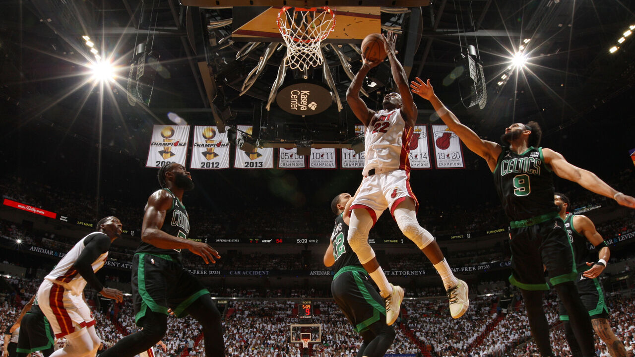 MIAMI, FL - MAY 21: Jimmy Butler #22 of the Miami Heat drives to the basket during Round 3 Game 3 of the Eastern Conference Finals 2023 NBA Playoffs against the Boston Celtics on May 21, 2023 at the Kaseya Center in Miami, Florida. Mandatory Copyright Notice: Copyright 2023 NBAE