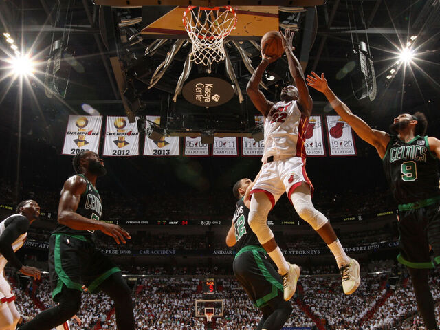 MIAMI, FL - MAY 21: Jimmy Butler #22 of the Miami Heat drives to the basket during Round 3 Game 3 of the Eastern Conference Finals 2023 NBA Playoffs against the Boston Celtics on May 21, 2023 at the Kaseya Center in Miami, Florida. Mandatory Copyright Notice: Copyright 2023 NBAE