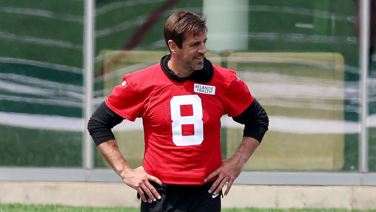 FLORHAM PARK, NEW JERSEY - MAY 23: Aaron Rodgers #8 of the New York Jets stretches during an offseason workout session at Atlantic Health Jets Training Center on May 23, 2023 in Florham Park, New Jersey.