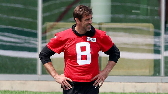 FLORHAM PARK, NEW JERSEY - MAY 23: Aaron Rodgers #8 of the New York Jets stretches during an offseason workout session at Atlantic Health Jets Training Center on May 23, 2023 in Florham Park, New Jersey.