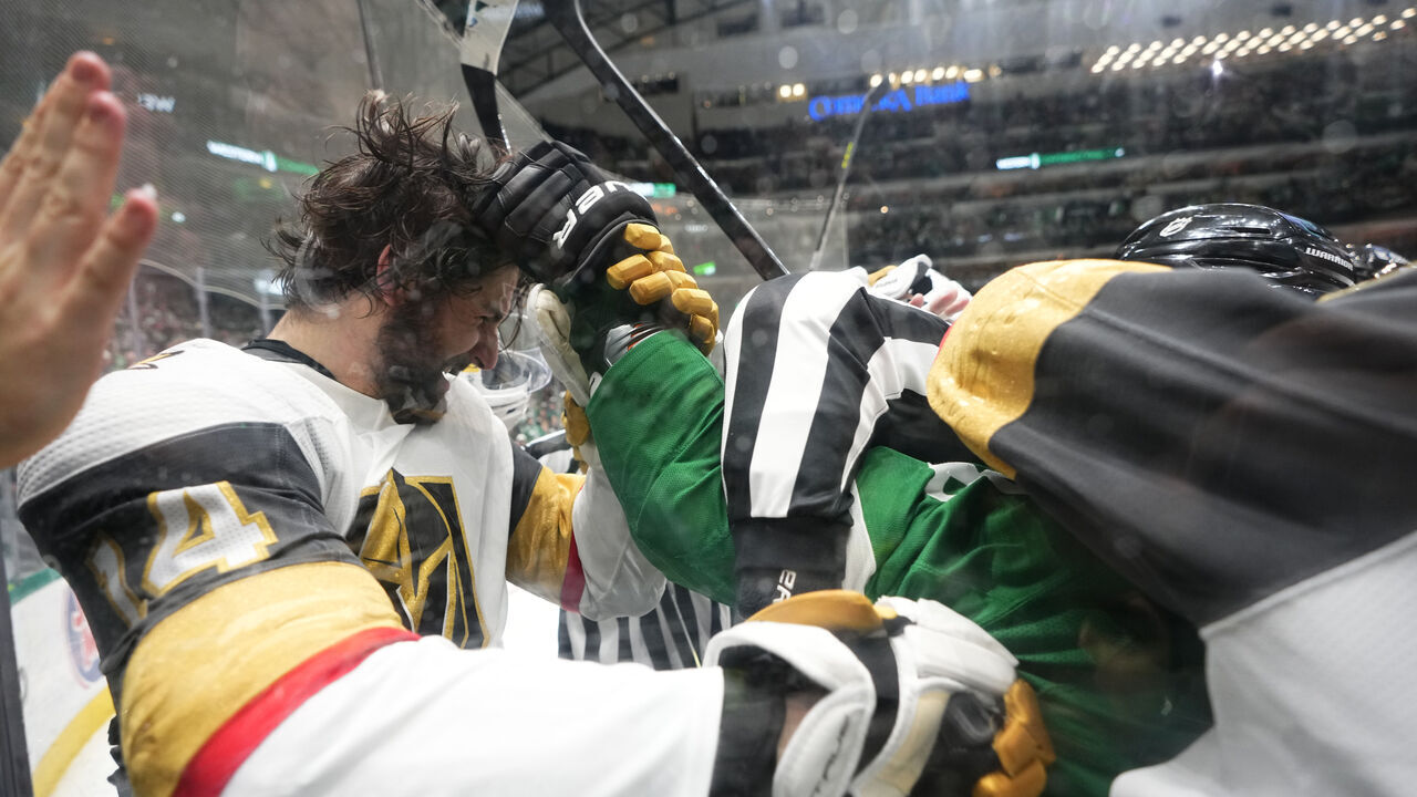 DALLAS, TEXAS - MAY 23: Max Domi #18 of the Dallas Stars fights with Nicolas Hague #14 of the Vegas Golden Knights during the second period in Game Three of the Western Conference Final of the 2023 Stanley Cup Playoffs at American Airlines Center on May 23, 2023 in Dallas, Texas.