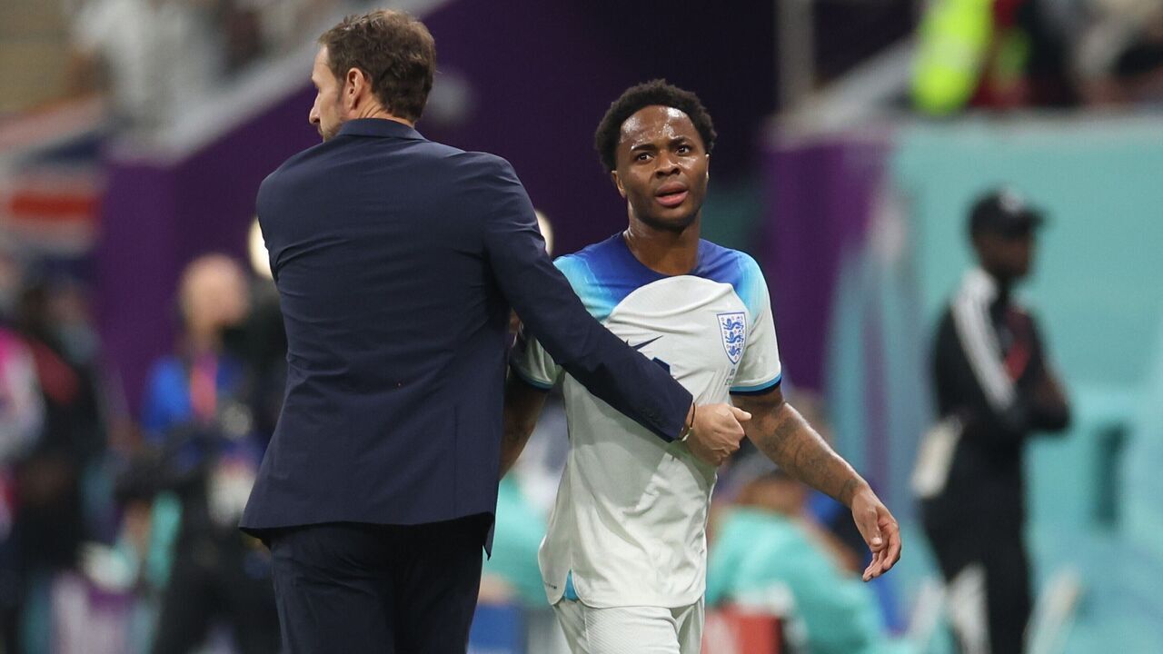 Raheem Sterling R of England reacts with Gareth Southgate, head coach of England, during the Group B match between England and the United States at the 2022 FIFA World Cup at Al Bayt Stadium in Al Khor, Qatar, Nov. 25, 2022.