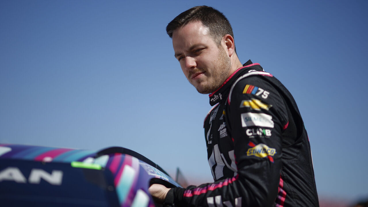 TALLADEGA, ALABAMA - APRIL 22: Alex Bowman, driver of the #48 Ally Chevrolet, enters his car during qualifying for the NASCAR Cup Series GEICO 500 at Talladega Superspeedway on April 22, 2023 in Talladega, Alabama.