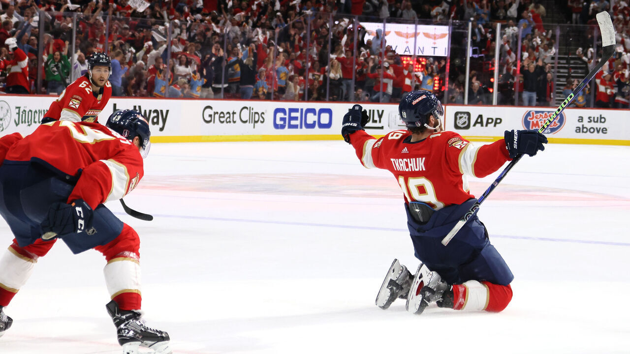 SUNRISE, FLORIDA - MAY 24: Matthew Tkachuk #19 of the Florida Panthers celebrates with his teammates after scoring the game winning goal on Frederik Andersen #31 of the Carolina Hurricanes during the third period in Game Four of the Eastern Conference Final of the 2023 Stanley Cup Playoffs at FLA Live Arena on May 24, 2023 in Sunrise, Florida.