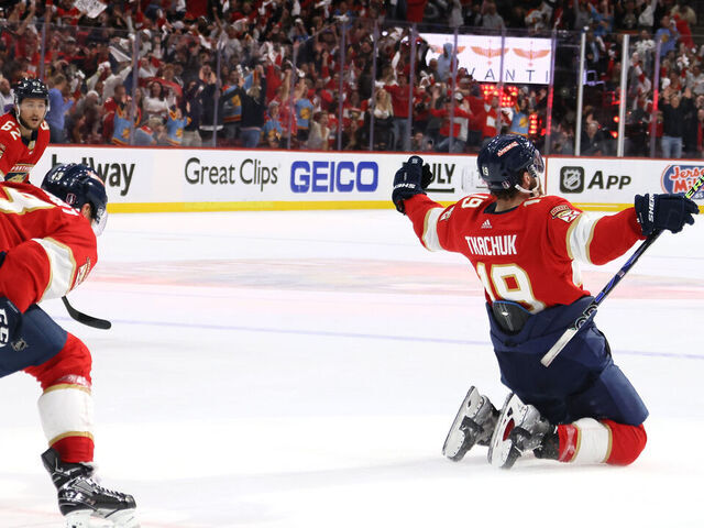 SUNRISE, FLORIDA - MAY 24: Matthew Tkachuk #19 of the Florida Panthers celebrates with his teammates after scoring the game winning goal on Frederik Andersen #31 of the Carolina Hurricanes during the third period in Game Four of the Eastern Conference Final of the 2023 Stanley Cup Playoffs at FLA Live Arena on May 24, 2023 in Sunrise, Florida.