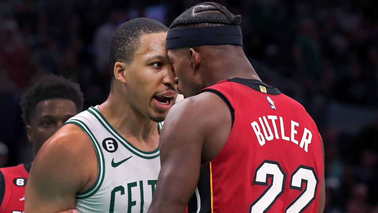 Boston, MA - May 19: Boston Celtics PF Grant Williams goes nose-to-nose with Miami Heat SF Jimmy Butler in the fourth quarter. The pair were issued off-setting technical fouls. The Celtics lost to the Heat, 111-105, in Game 2 of the 2023 Eastern Conference Finals.