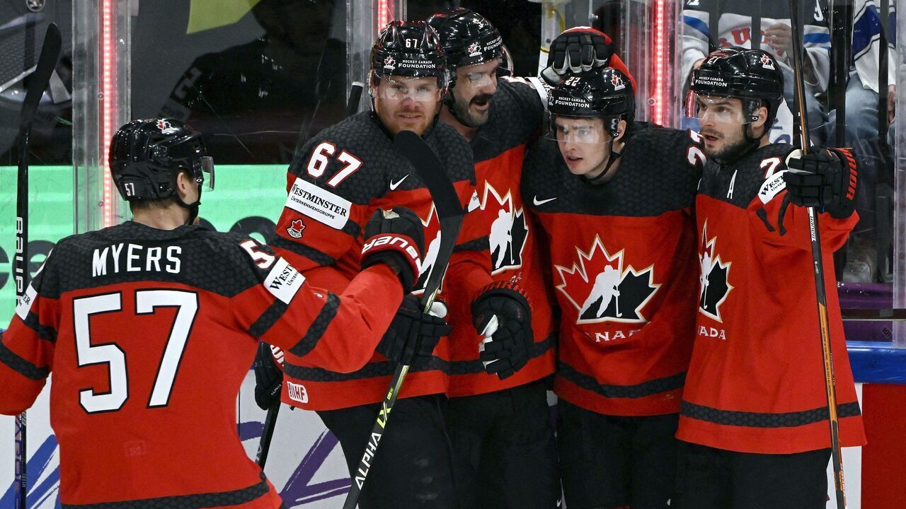 Players of Canada celebrate their 1-0 goal by Canada's forward Jack Quinn (2ndR) during the IIHF Ice Hockey Men's World Championships quarter final match between Canada and Finland in Tampere, Finland, on May 25, 2023.