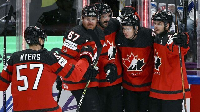 Players of Canada celebrate their 1-0 goal by Canada's forward Jack Quinn (2ndR) during the IIHF Ice Hockey Men's World Championships quarter final match between Canada and Finland in Tampere, Finland, on May 25, 2023.
