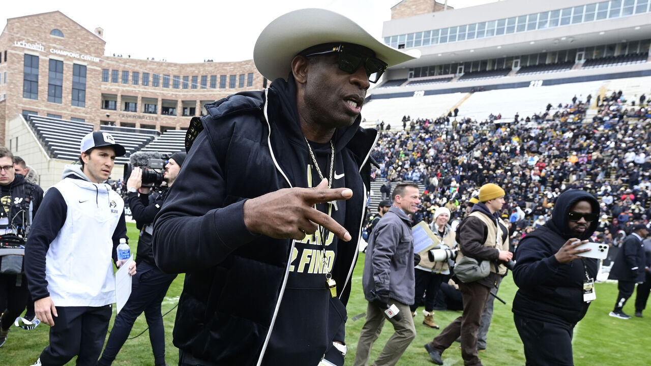 BOULDER, CO - APRIL 22: University of Colorado Buffaloes head coach Deion Sanders takes the field for warmups before the Black and Gold game at Folsom Field April 22, 2023.