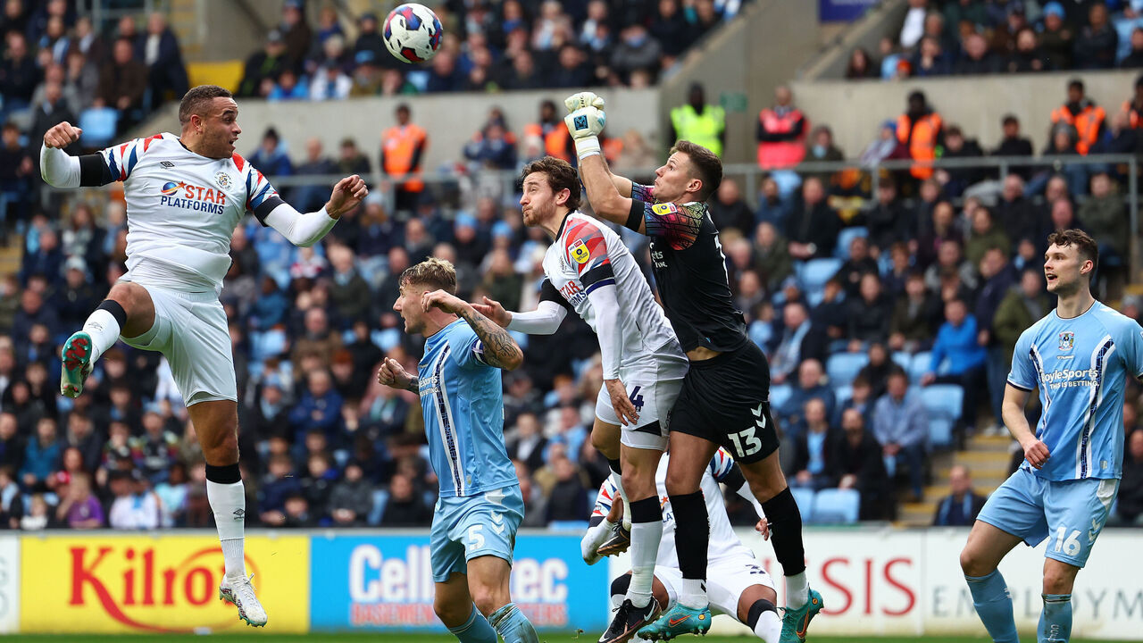 COVENTRY, ENGLAND - FEBRUARY 11: Coventry City goalkeeper Ben Wilson Clears an attack during the Sky Bet Championship between Coventry City and Luton Town at The Coventry Building Society Arena on February 11, 2023 in Coventry, England.