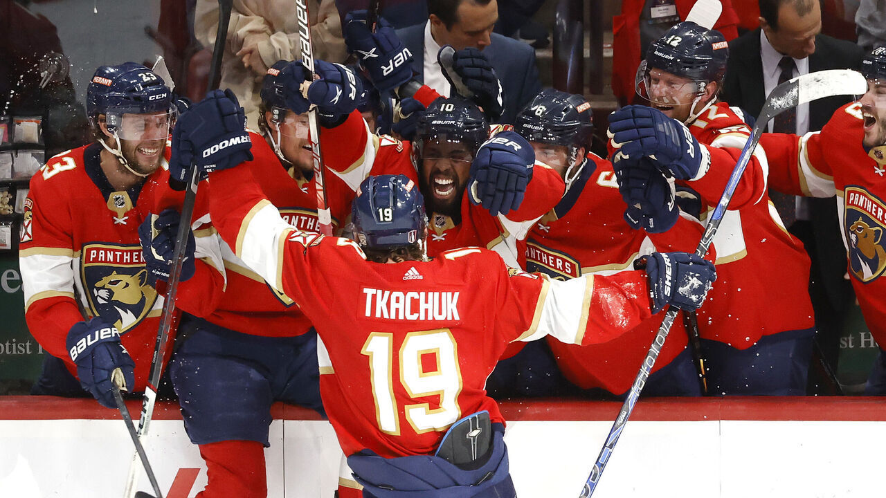 SUNRISE, FLORIDA - MAY 24: Matthew Tkachuk #19 of the Florida Panthers celebrates with his teammates after scoring the game winning goal on Frederik Andersen #31 of the Carolina Hurricanes during the third period in Game Four of the Eastern Conference Final of the 2023 Stanley Cup Playoffs at FLA Live Arena on May 24, 2023 in Sunrise, Florida.