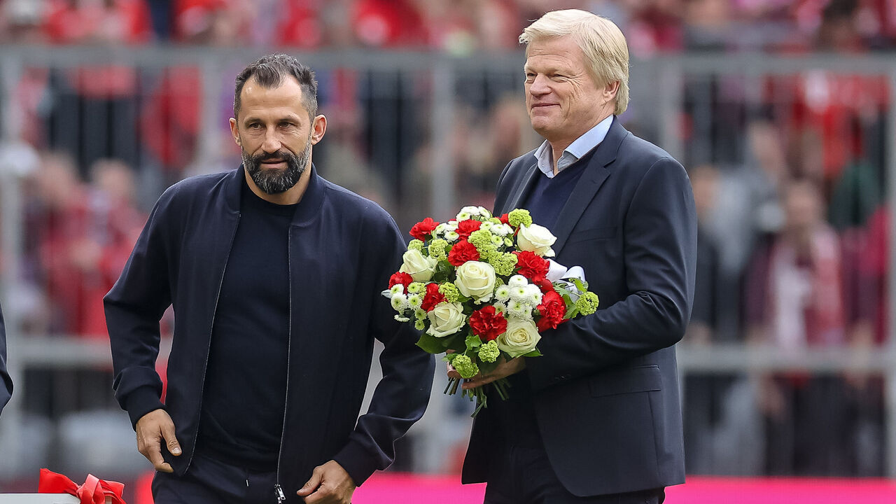 MUNICH, GERMANY - MAY 08: chief of sport Hasan Salihamidzic of Bayern Muenchen and Oliver Kahn of Bayern Muenchen look on prior to the Bundesliga match between FC Bayern München and VfB Stuttgart at Allianz Arena on May 8, 2022 in Munich, Germany.