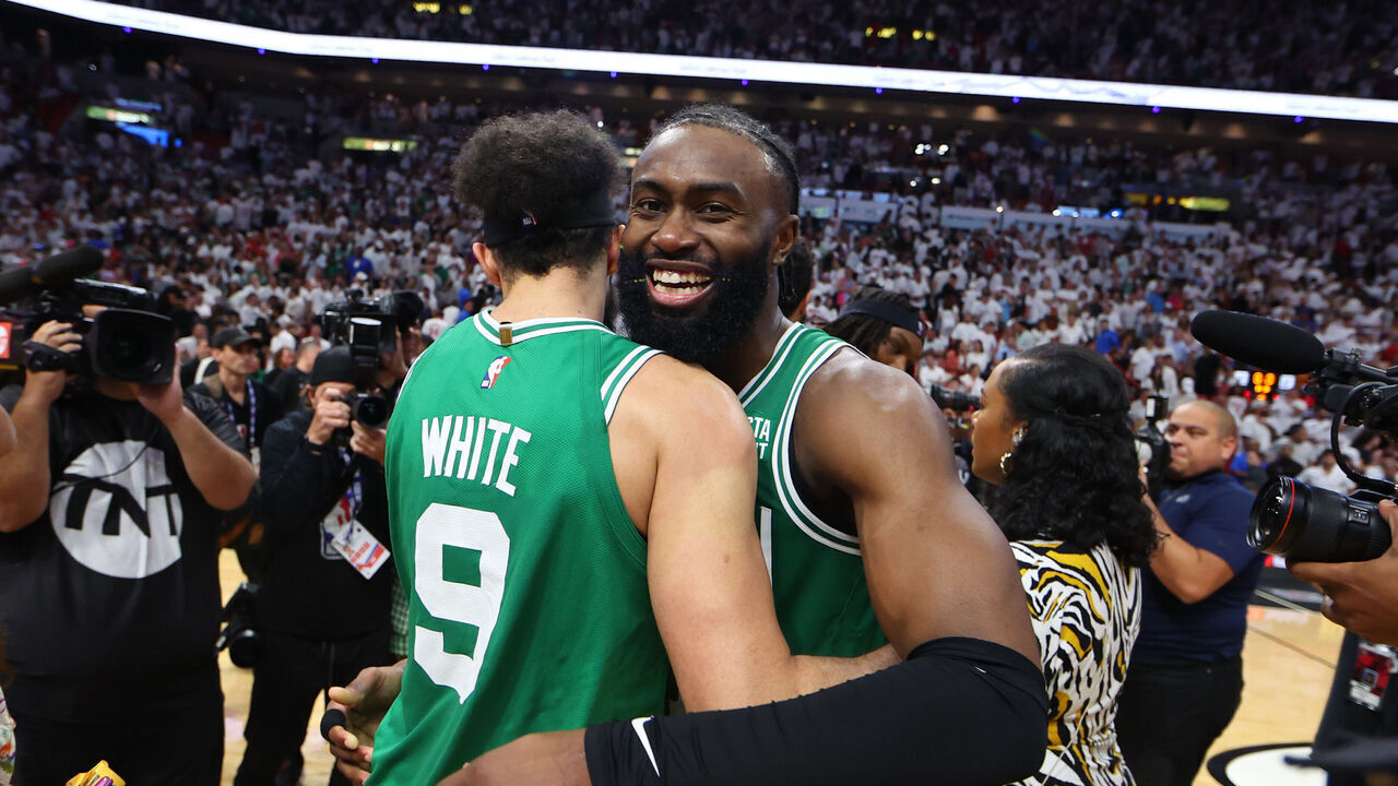 MIAMI, FLORIDA - MAY 27: Derrick White #9 and Jaylen Brown #7 of the Boston Celtics react after defeating the Miami Heat 104-103 in game six of the Eastern Conference Finals at Kaseya Center on May 27, 2023 in Miami, Florida.