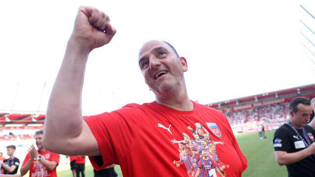 REGENSBURG, GERMANY - MAY 28: Frank Schmidt, Head Coach of 1. FC Heidenheim 1846, celebrates after the team's victory and promotion to the Bundesliga in the Second Bundesliga match between SSV Jahn Regensburg and 1. FC Heidenheim 1846 at Jahnstadion on May 28, 2023 in Regensburg, Germany.
