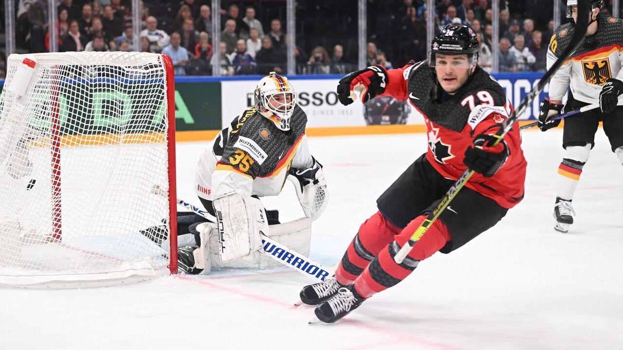 Canada's forward Sammy Blais (C) scores the 1-1 goal past Germany's goalkeeper Mathias Niederberger (L) during the IIHF Ice Hockey Men's World Championships final match betweeen Canada and Germany in Tampere, Finland, on May 28, 2023.