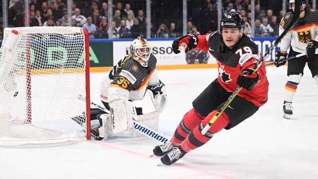 Canada's forward Sammy Blais (C) scores the 1-1 goal past Germany's goalkeeper Mathias Niederberger (L) during the IIHF Ice Hockey Men's World Championships final match betweeen Canada and Germany in Tampere, Finland, on May 28, 2023.