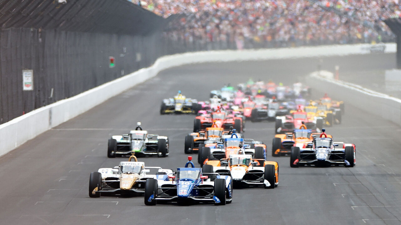 INDIANAPOLIS, INDIANA - MAY 28: Alex Palou, driver of the #10 The American Legion Chip Ganassi Racing Honda, leads the pack of drivers at the start of The 107th Running of the Indianapolis 500 at Indianapolis Motor Speedway on May 28, 2023 in Indianapolis, Indiana.