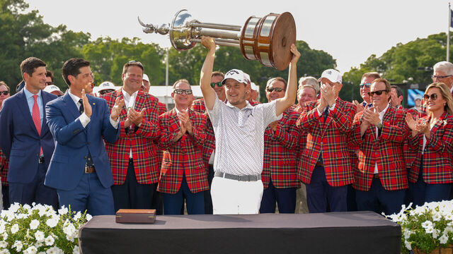 FT. WORTH, TX - MAY 28: Emiliano Grillo of Argentina receives his trophy on the free of hole #18 during the Final Round of the Charles Schwab Challenge at Colonial Country Club on May 28, 2023 in Ft. Worth, Texas. .