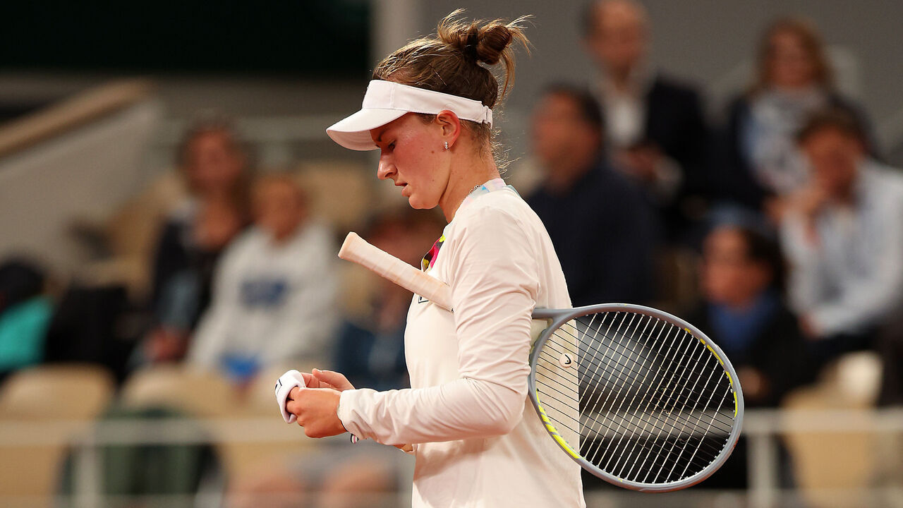 PARIS, FRANCE - MAY 23: Barbora Krejcikova of Czech Republic returns to the court following a pause in play against Diane Parry of France during the Women's Singles First Round match on Day 2 of The 2022 French Open at Roland Garros on May 23, 2022 in Paris, France.