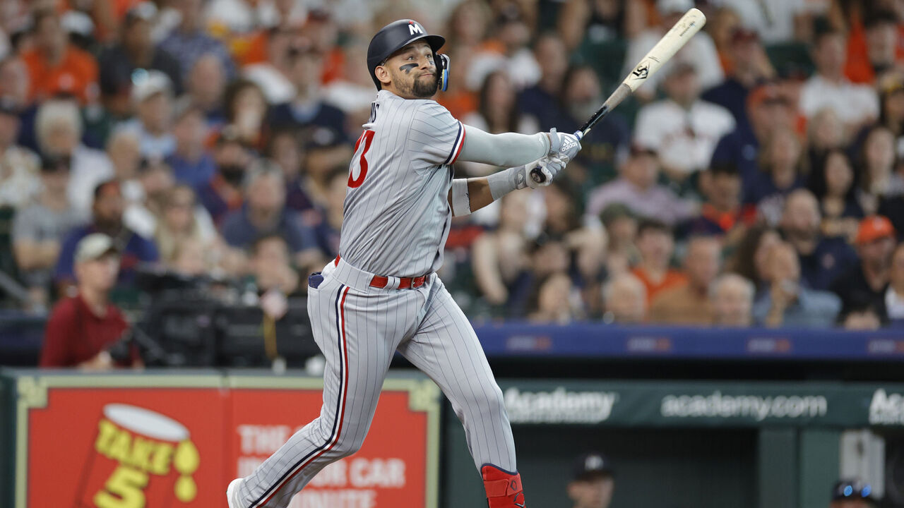HOUSTON, TEXAS - MAY 29: Royce Lewis #23 of the Minnesota Twins hits a three run home run during the third inning against the Houston Astros at Minute Maid Park on May 29, 2023 in Houston, Texas.
