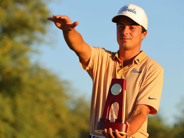 SCOTTSDALE, AZ - MAY 29: Fred Biondi of the Florida Gators celebrates with the stroke national champion trophy during the Division I Men's Golf Championship held at Grayhawk Golf Club on May 29, 2023 in Scottsdale, Arizona.