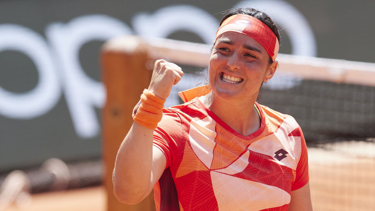 PARIS, FRANCE - MAY 30: Ons Jabeur of Tunisia celebrates after winning match point against Lucia Bronzetti of Italy during their Women's Singles First Round Match on Day Three of the 2023 French Open at Roland Garros on May 30, 2023 in Paris, France.