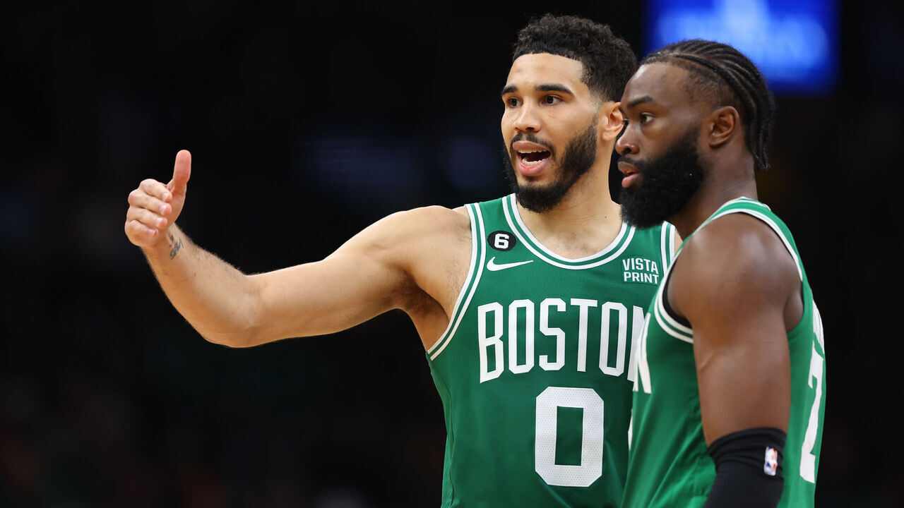 BOSTON, MASSACHUSETTS - MAY 25: Jayson Tatum #0 talks with Jaylen Brown #7 of the Boston Celtics against the Miami Heat during the fourth quarter in game five of the Eastern Conference Finals at TD Garden on May 25, 2023 in Boston, Massachusetts.