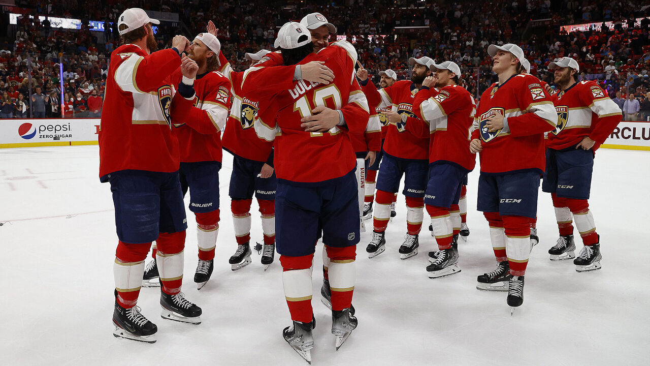 SUNRISE, FLORIDA - MAY 24: Anthony Duclair #10 and Aleksander Barkov #16 of the Florida Panthers hug after their 4-3 win over the Carolina Hurricanes in Game Four of the Eastern Conference Final of the 2023 Stanley Cup Playoffs at the FLA Live Arena on May 24, 2023 in Sunrise, Florida.