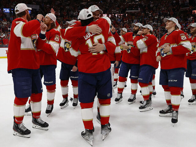 SUNRISE, FLORIDA - MAY 24: Anthony Duclair #10 and Aleksander Barkov #16 of the Florida Panthers hug after their 4-3 win over the Carolina Hurricanes in Game Four of the Eastern Conference Final of the 2023 Stanley Cup Playoffs at the FLA Live Arena on May 24, 2023 in Sunrise, Florida.