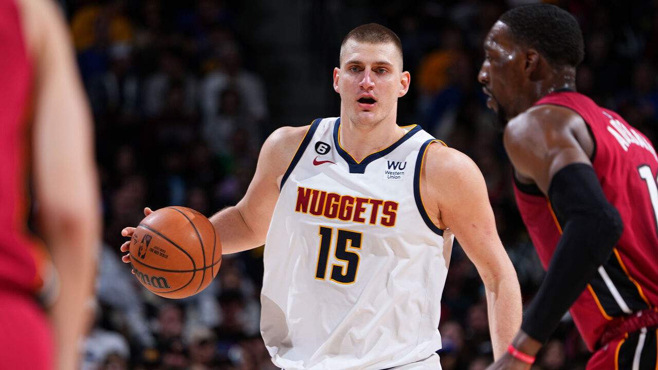 DENVER, CO - DECEMBER 30: Nikola Jokic #15 of the Denver Nuggets dribbles the ball during the game against the Miami Heat on December 30, 2022 at the Ball Arena in Denver, Colorado. NOTE TO USER: User expressly acknowledges and agrees that, by downloading and/or using this Photograph, user is consenting to the terms and conditions of the Getty Images License Agreement. Mandatory Copyright Notice: Copyright 2022 NBAE