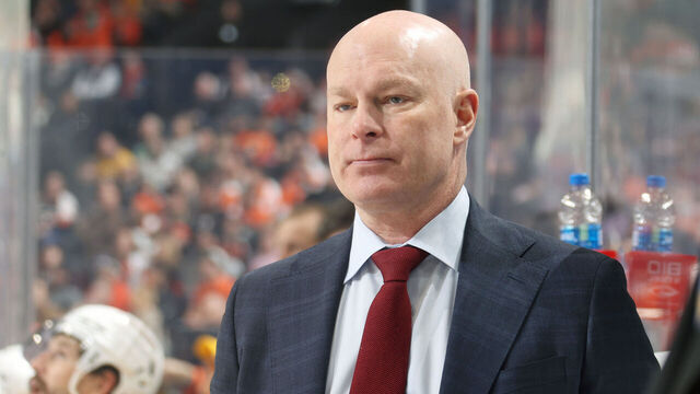 PHILADELPHIA, PENNSYLVANIA - FEBRUARY 11: Head Coach of the Nashville Predators John Hynes watches the play on the ice during the first period against the Philadelphia Flyers at the Wells Fargo Center on February 11, 2023 in Philadelphia, Pennsylvania.