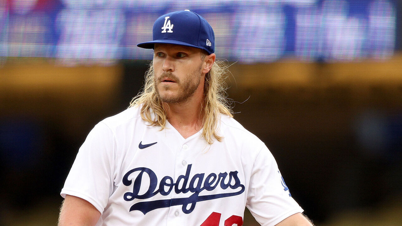 LOS ANGELES, CALIFORNIA - MAY 31: Noah Syndergaard #43 of the Los Angeles Dodgers reacts after a two run homerun from Jeimer Candelario #9 of the Washington Nationals, for a 5-4 Nationals lead, during the fifth inning at Dodger Stadium on May 31, 2023 in Los Angeles, California.