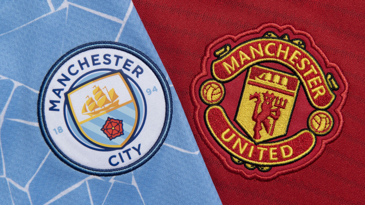 MANCHESTER, ENGLAND - MAY 24: The club badges of Manchester City and Manchester United ahead of the 2023 FA Cup Final on May 24, 2023 in Manchester, United Kingdom.