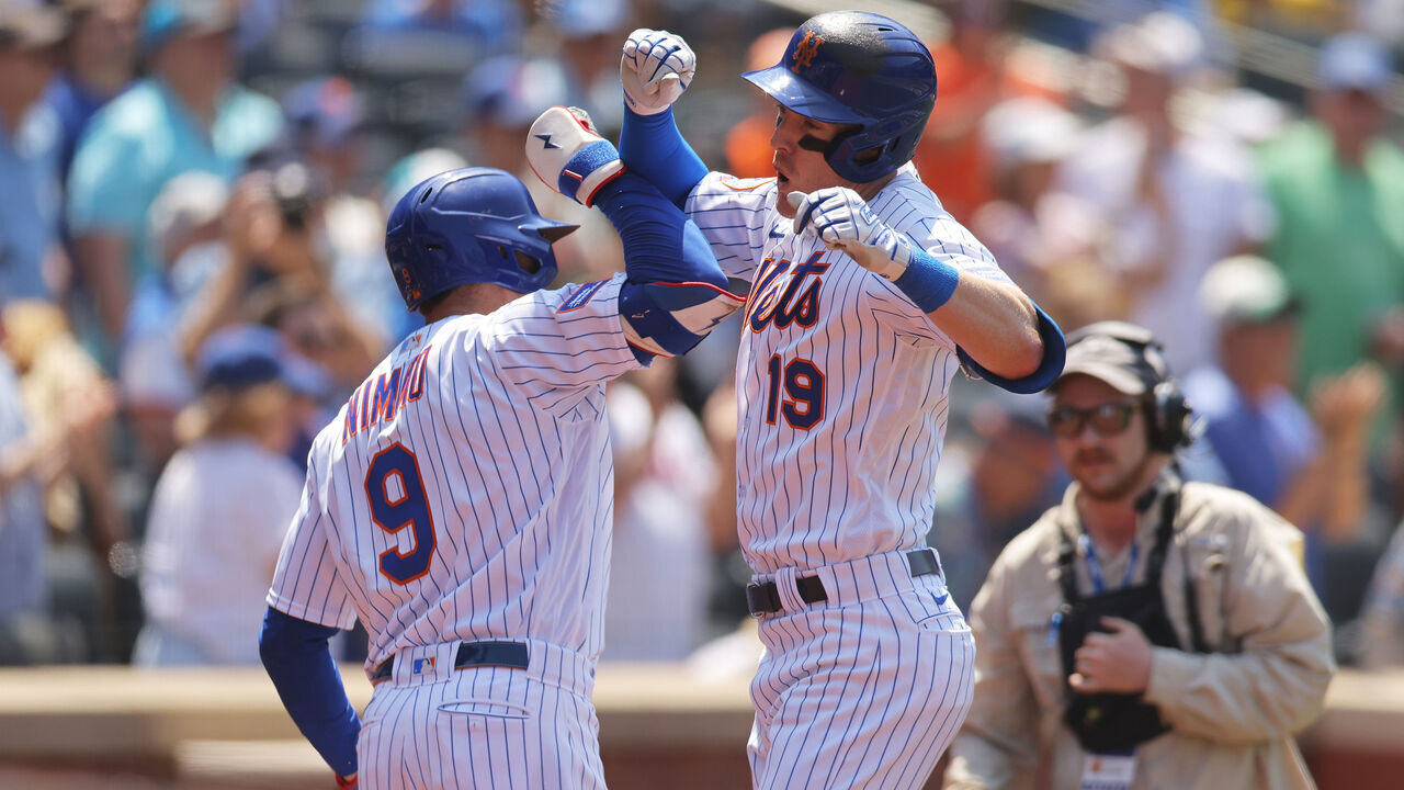 NEW YORK, NEW YORK - JUNE 01: Mark Canha #19 of the New York Mets celebrates with Brandon Nimmo #9 after hitting a two-run home run against the Philadelphia Phillies in the fourth inning at Citi Field on June 01, 2023 in New York City.