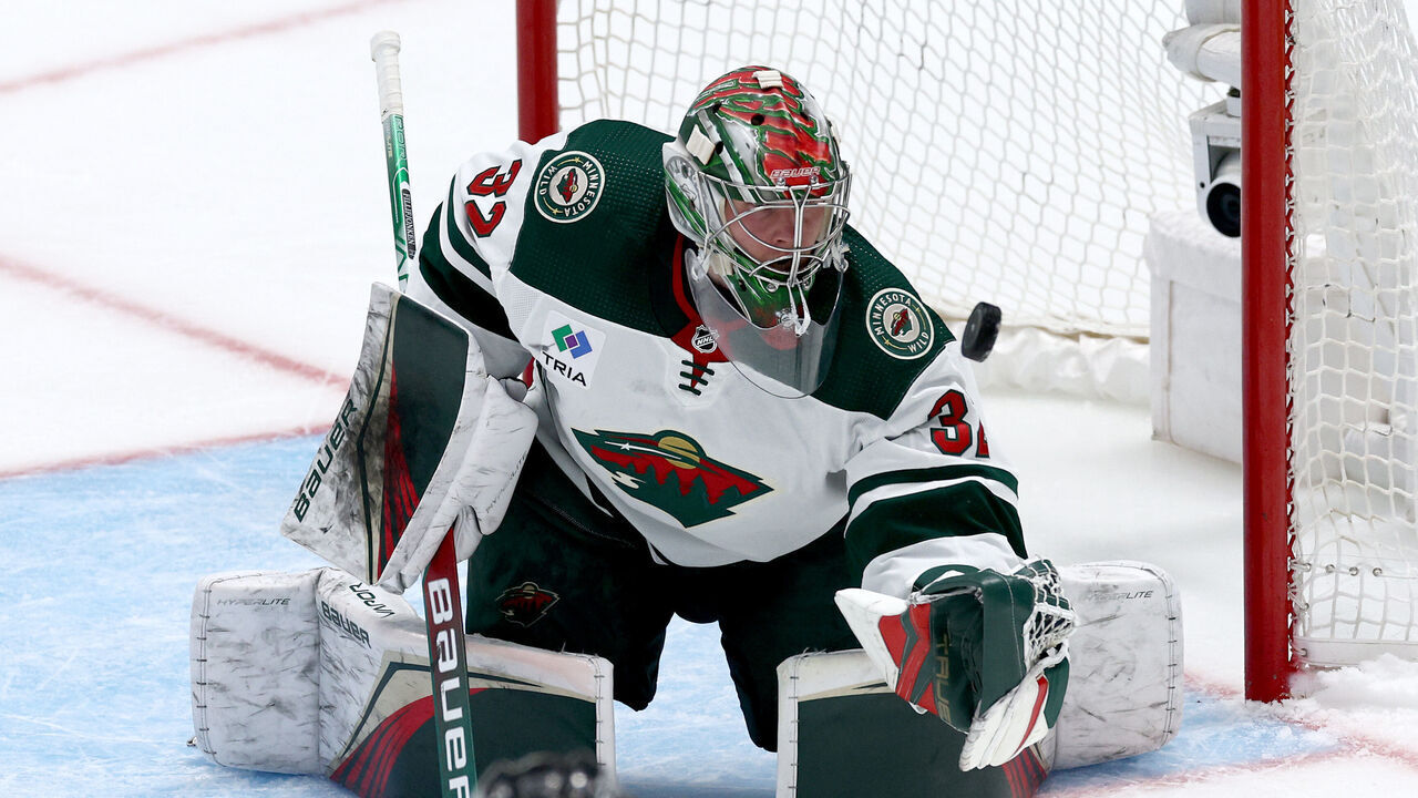 DALLAS, TEXAS - APRIL 17: Filip Gustavsson #32 of the Minnesota Wild blocks a shot on goal against the Dallas Stars in the first overtime period in Game One of the First Round of the 2023 Stanley Cup Playoffs at American Airlines Center on April 17, 2023 in Dallas, Texas.