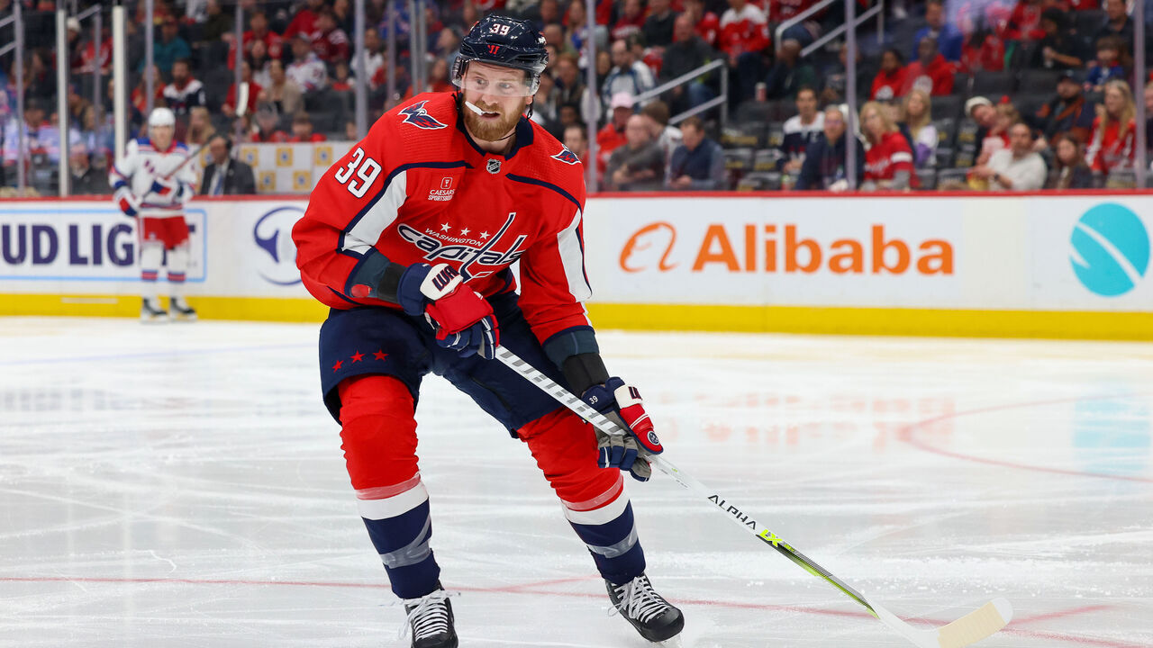 WASHINGTON, DC - APRIL 2: Washington Capitals right wing Anthony Mantha #39 skates to a loose puck during a game against the New York Rangers at Capital One Arena on April 2, 2023 in Washington, D.C.